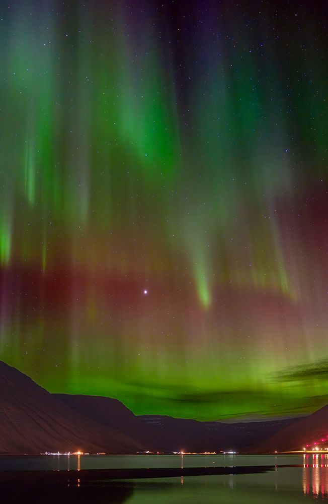 Iceland. Northern Lights over Isafjordur, the capital of the Westfjords during autumn.